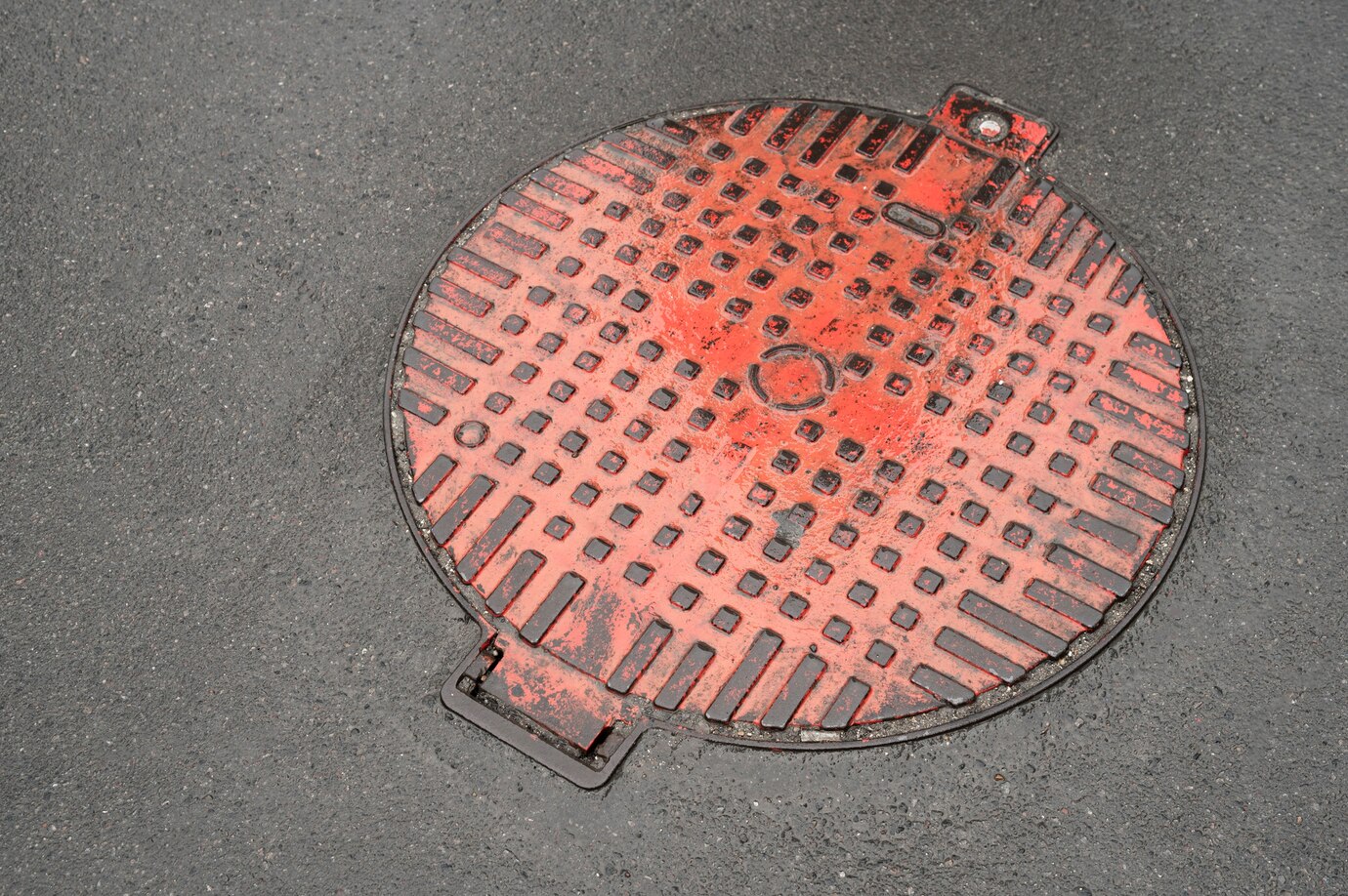 outdoors-cobblestone-texture-with-manhole_23-2149432995